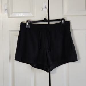 Athleta Womens Black Pull On Shorts Size 8 Zip Pockets Vent Holes At Hem Sporty